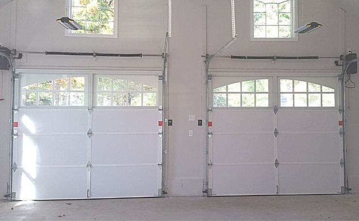 Carriage style doors seen from inside a finished garage